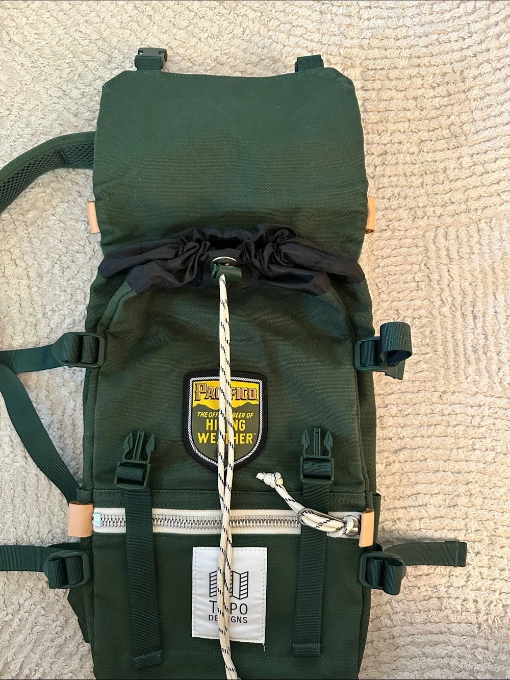 Topo Designs Mini River Green Canvas Backpack with White Zip Pocket